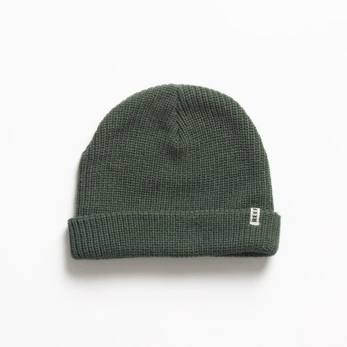 Alyx Beanie in dark green knit fabric shown flat with folded cuff and small REEF tag, designed for comfort and style.