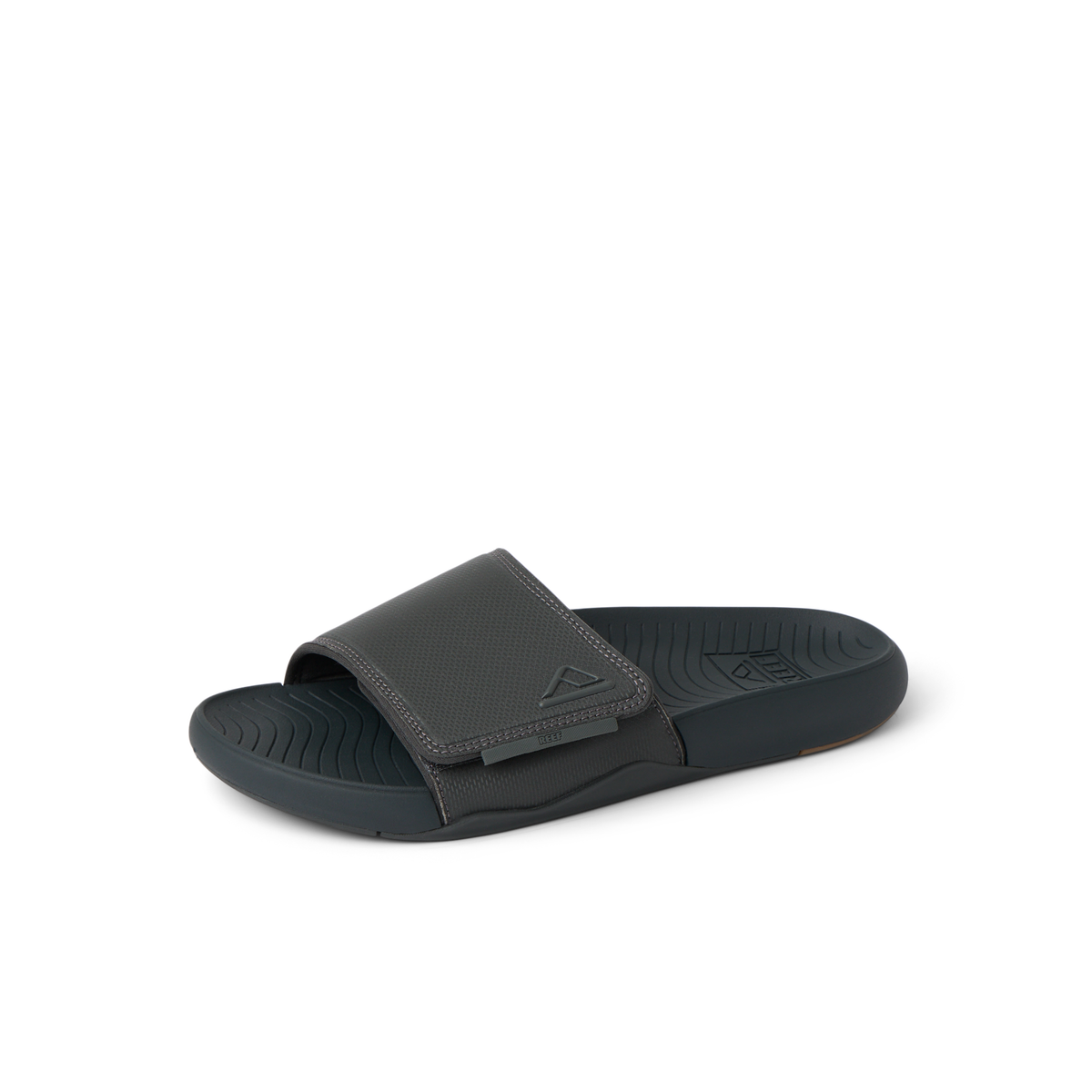 Men's Phantom Slab slide facing left, black water-friendly sandal with cushioned, arch-support footbed close-up.