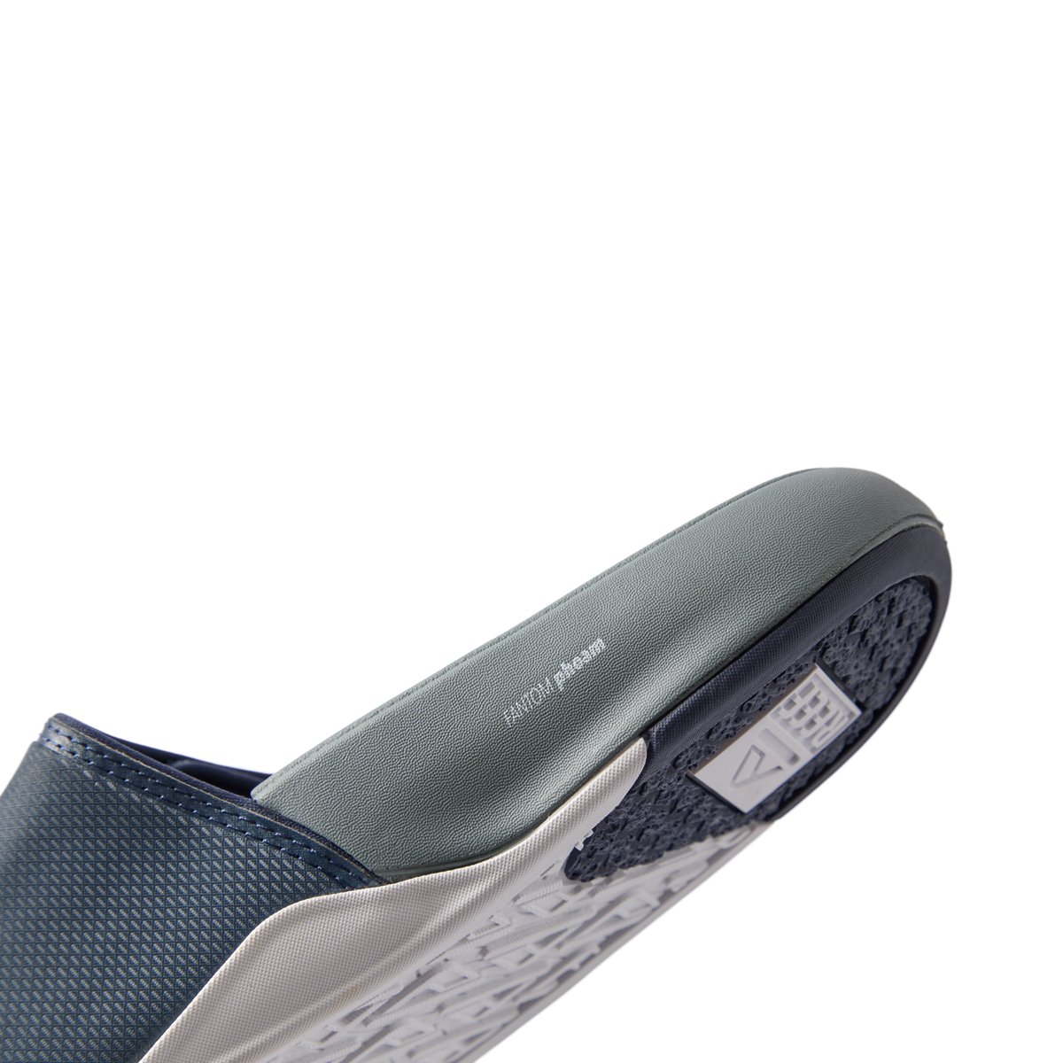 Phantom Slab men's footwear showing right side close-up of cushioned arch support and water-friendly sole design