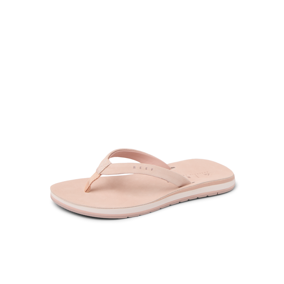 Ojai Classic Slim sandal facing left, close-up of cushioned arch support in blush suede, beach-inspired comfort design.