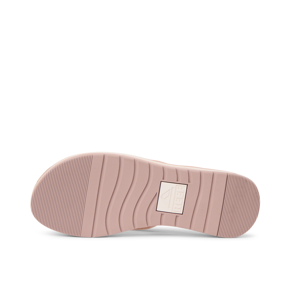 Ojai Classic Slim shoe sole facing up, showing durable textured outsole with anatomical arch support in blush suede color.