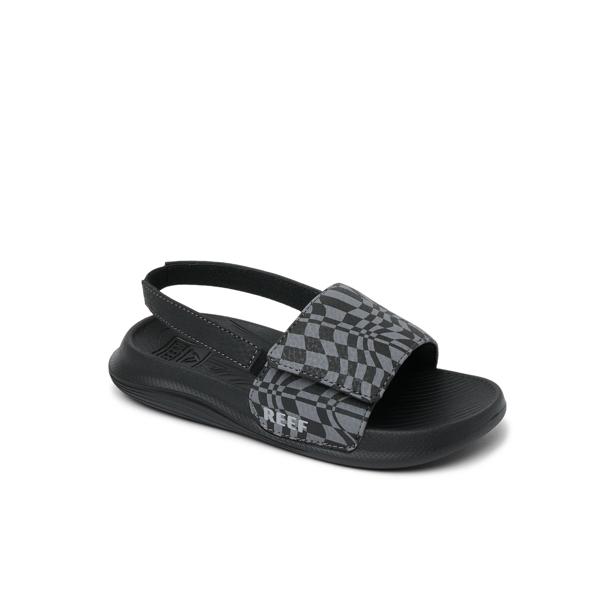 Little Salty Slide for boys facing right, water-friendly comfort sandal with checker pattern and soft cushioning.