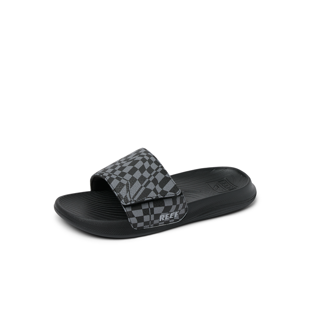 Kids Salty Slide facing right, black swell checker pattern, close-up of water-friendly slide with arch support and cushioning.