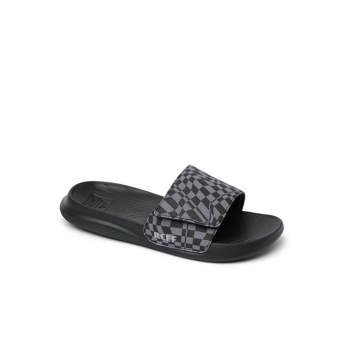 Kids Salty Slide facing right, black swell checker pattern, breathable water-friendly slide with arch support and cushioning