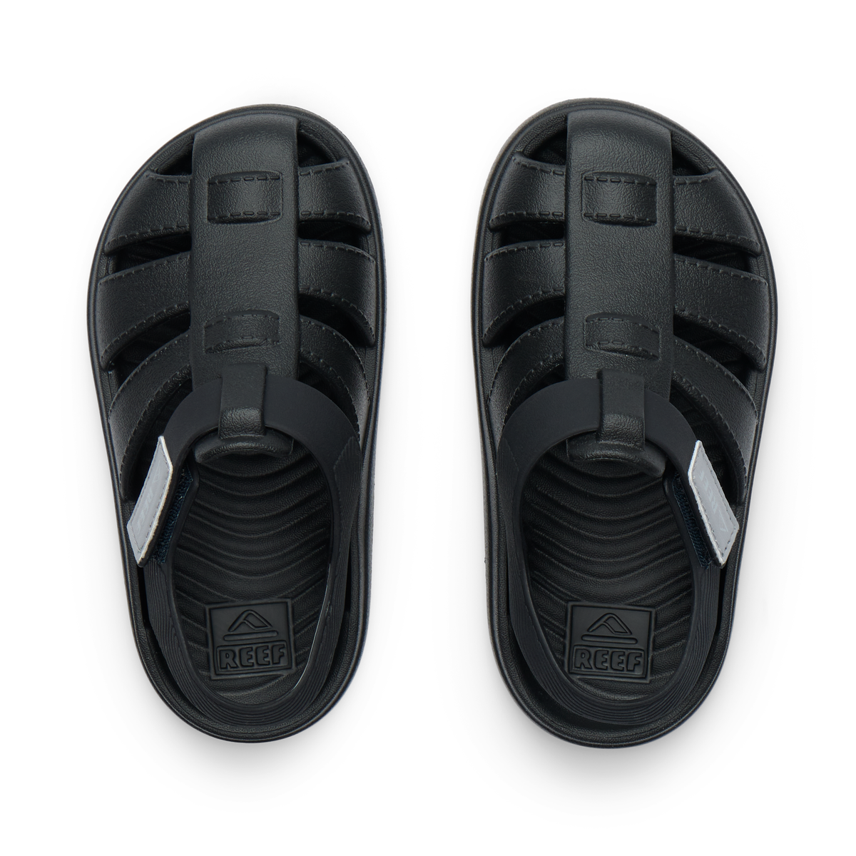 Top view of black Little Totally Beachin boys sandals featuring anatomical arch support and soft-rebound cushioning for comfort.