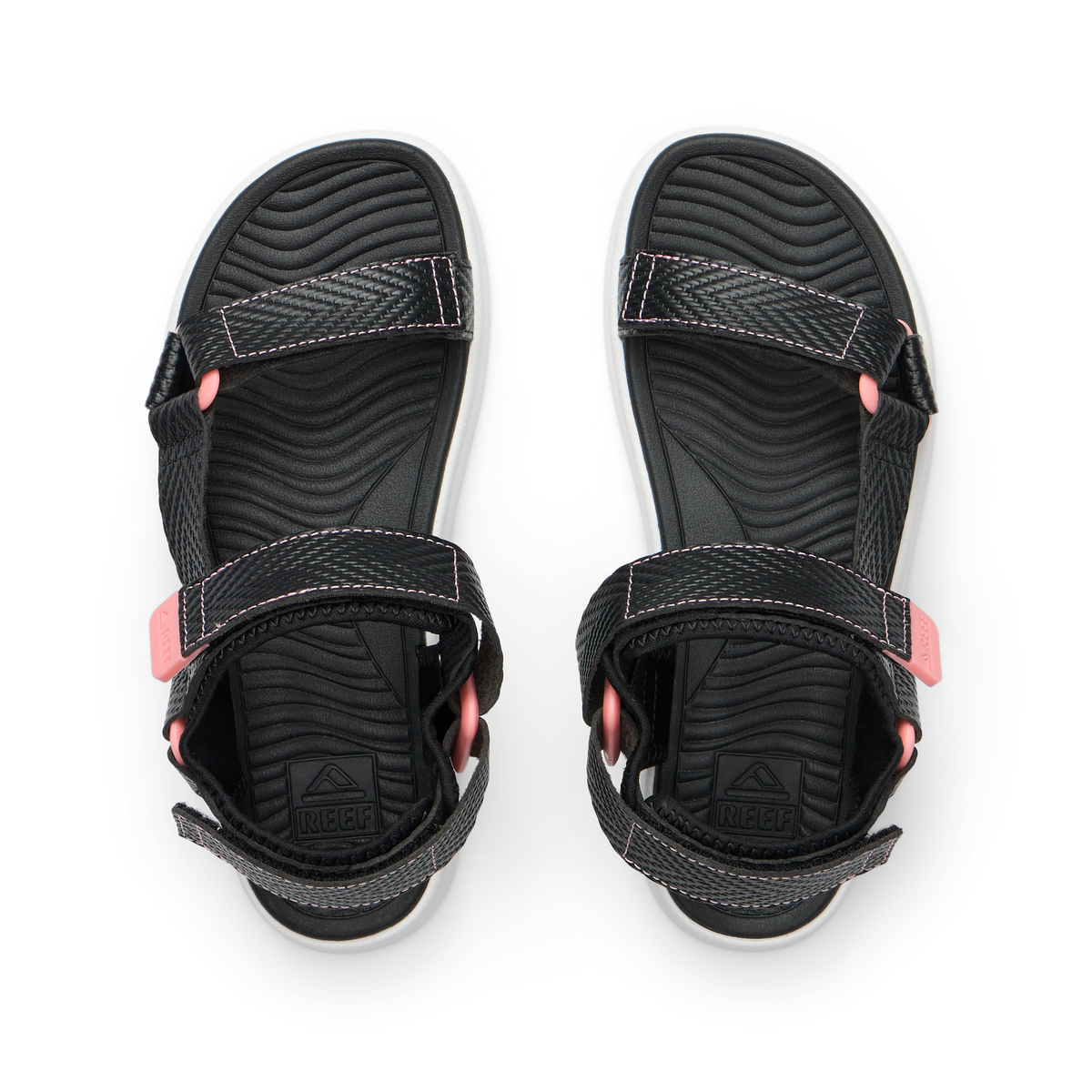 Top view of Kids Shoremazing black and pink sandals with adjustable straps, soft footbed, and anatomical arch support.