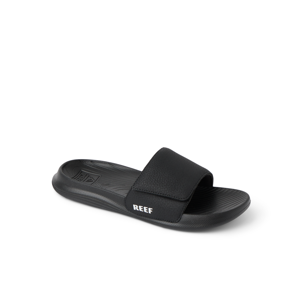 Kids Salty Slide facing right, black and white, beach-inspired slide with anatomical arch support and soft cushioning.