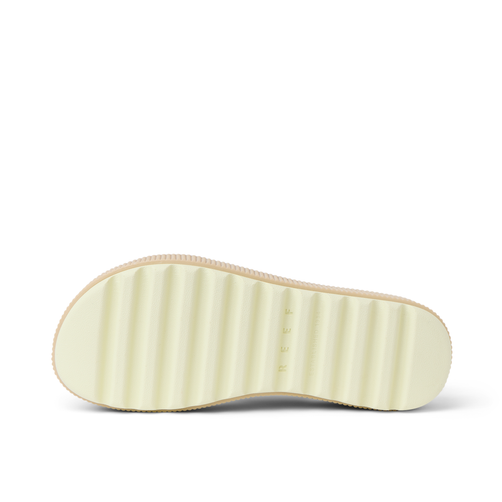 Bottom sole view of Water Vista Higher women's shoe showing ridged, cushioned outsole designed for comfort and beach-friendly wear.