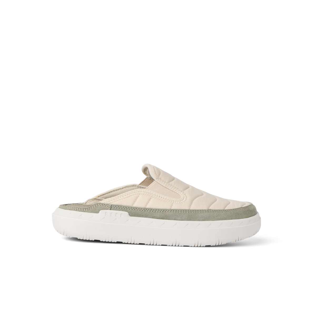 Rambler Kicker mule facing right with soft oatmeal upper, cushioned memory foam footbed, and lightweight white EVA sole for comfort