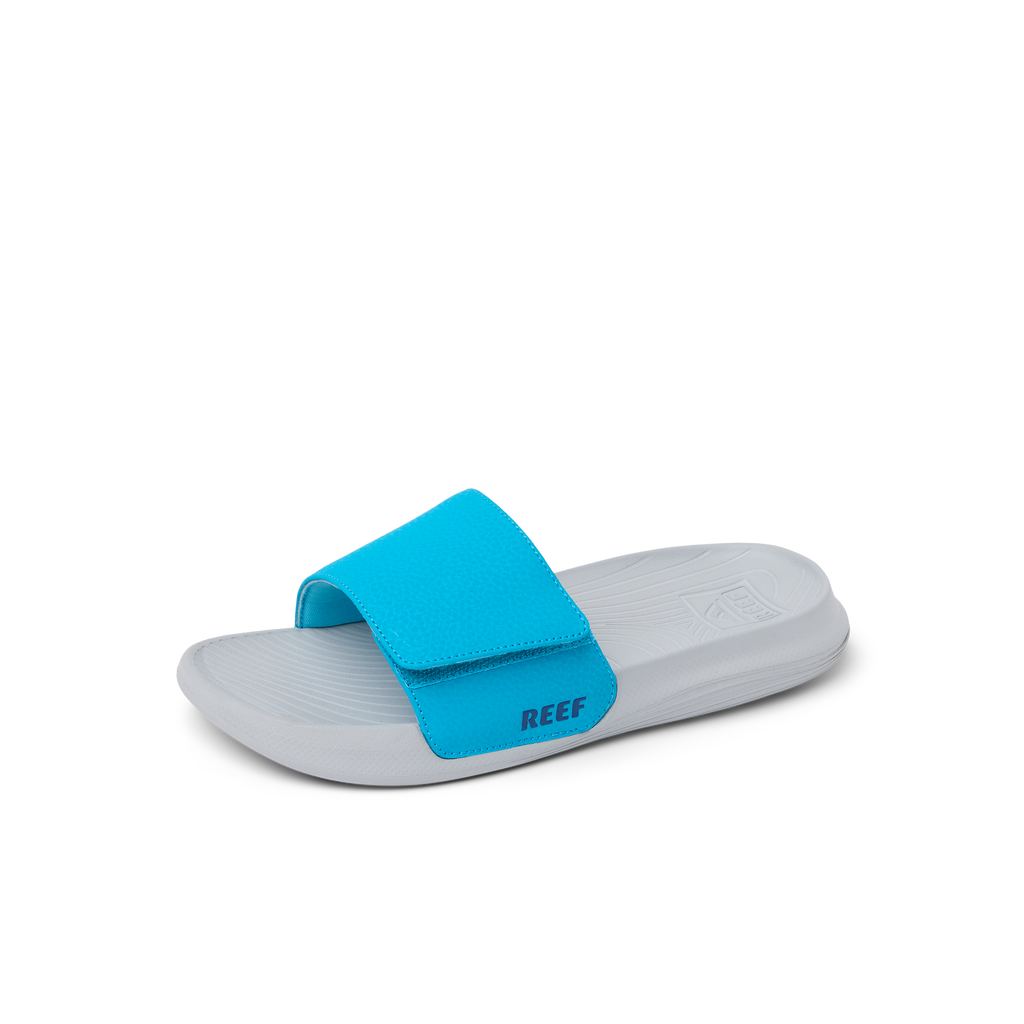 Kids Salty Slide showing right side facing, beach-inspired with soft-rebound cushioning and anatomical arch support.