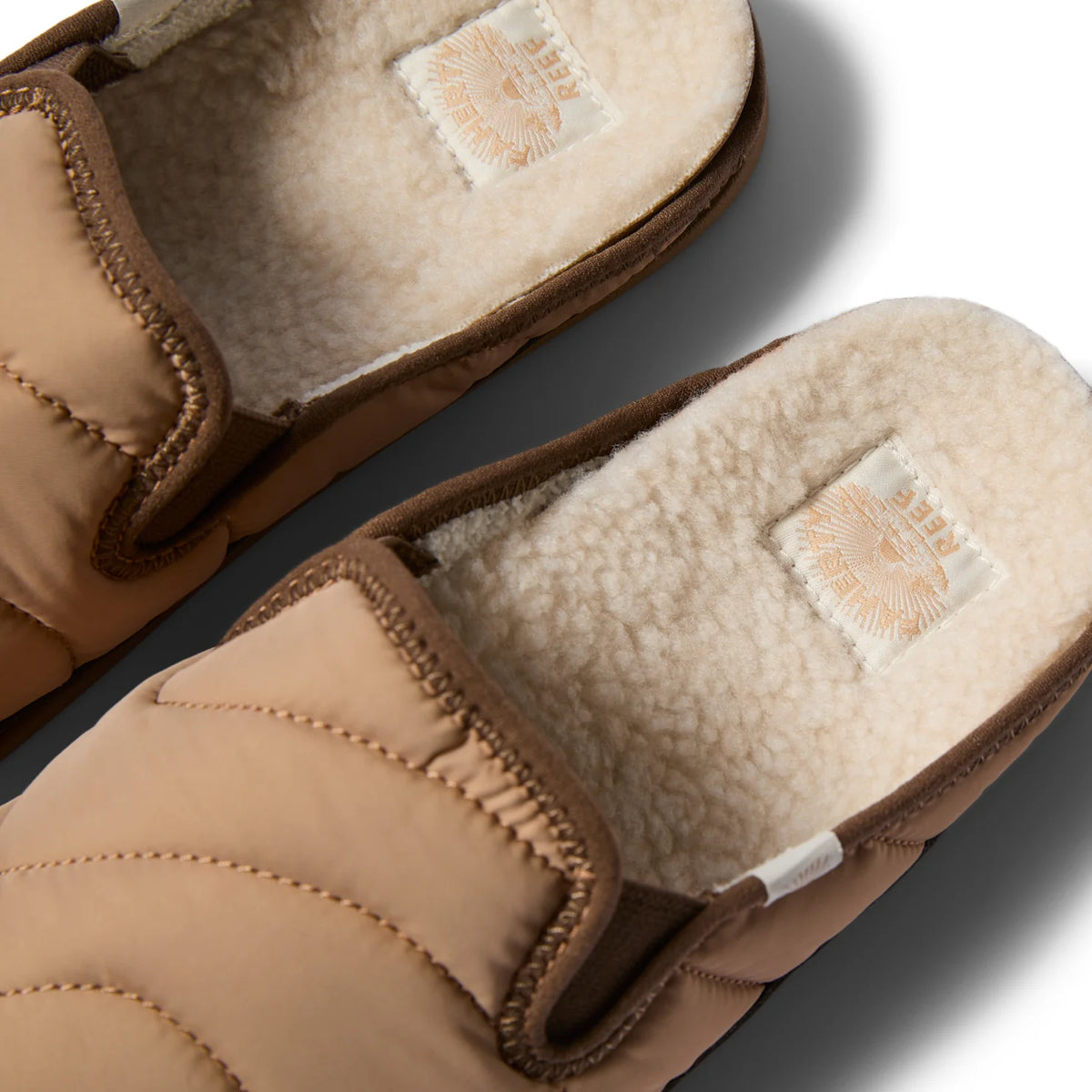 Top view close-up of brown Cushion Homey slippers for men featuring soft shearling lining and padded upper for comfort