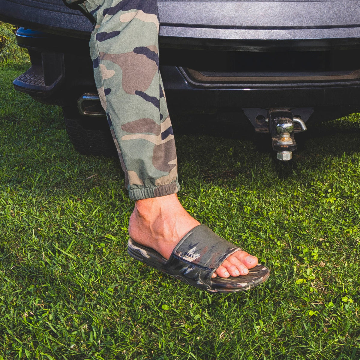 Fanning Slide H2O on a left foot facing right, showing top and side view with water-friendly soft-cushioned footbed.