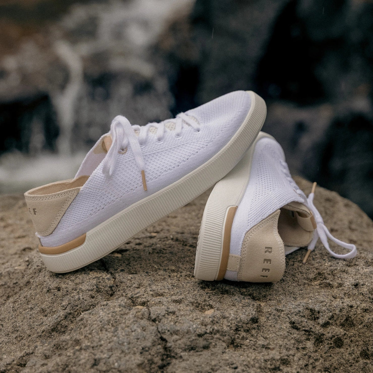 White Reef Neptune sneakers for women showing left side and back with anatomical arch support and cushioning